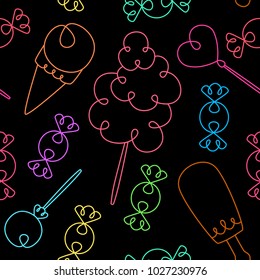 Seamless pattern with sweets on black background.