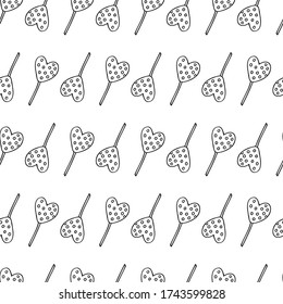 Seamless pattern of sweets in the shape of a heart. Lollipop. Contour drawing of candy with a black liner on a white background. Vector image. Print for textiles, notebook covers, menus, wrapping 