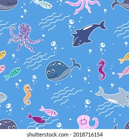 Seamless pattern with swimming fish, whales, sharks, octopuses and seahorses. Childish background of cute inhabitants of the seas and oceans. Vector illustration.