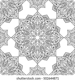 Seamless pattern of symbolic mandala on a white background. Oriental ornament. Template for carpet, shawl, wallpaper, embroidery.