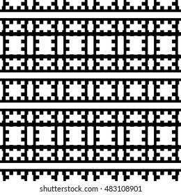 Seamless pattern with symmetric ornament. White color figures and lines composition on black background. Embroidery motif. Ornamental abstract wallpaper. Vector illustration