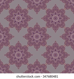 Seamless pattern with symmetric ornate. Tile design with purple pastel colors.
