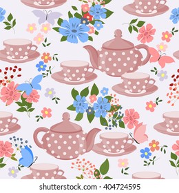 Seamless pattern with teapots, cups and butterflies. Teapots, cups of tea, flowers and butterflies.
