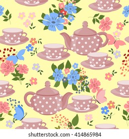 Seamless pattern with teapots, cups and butterflies. Teapots, cups of tea, flowers and butterflies.