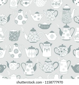 Seamless pattern with teapots with ornaments on blue background