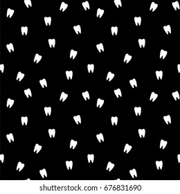 Seamless pattern with teeth on a black background. Vector illustration.