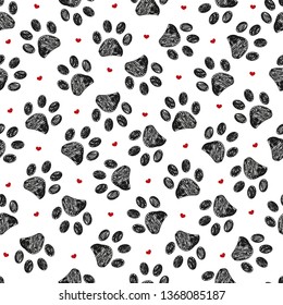 Seamless pattern for textile design. Seamless black paw print with red hearts pattern background