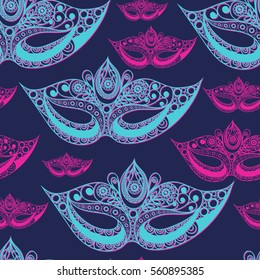 Seamless pattern (texture) with abstract decorative mask (symbol of the carnival in Venice). Suitable for design: fabric, cloth, wallpaper, wrapping, packaging. Vector illustration.