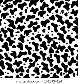 Seamless pattern with the texture of a cow, leopard, jaguar. Texture of wild animals on an isolated background. Imitation of a cow. Abstraction animal skins. For textiles, packaging design, wallpaper