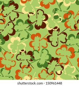 Seamless pattern texture with fallen leaves on green background