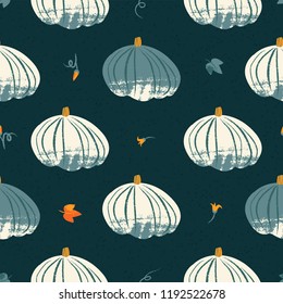 Seamless pattern with textured pumpkin in pastel colors on dark background. Hand drawn colorful vector illustration. Craft stamp style. Halloween or harvest background.