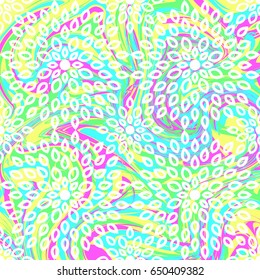 Seamless pattern in tie-dye style and mosaic. Multicolored dynamic background with elements of ornament. Patterns for edible icing sheets for covering cakes.