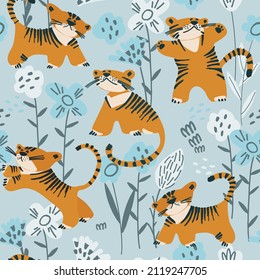 Seamless pattern with tiger cubs playing among the flowers. Childs drawing style. Wallpaper, backgound for kids. Perfect for baby, toddler clothing, bed linen
