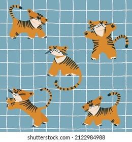 Seamless pattern with tiger cubs playing among the flowers. Childs drawing style. Wallpaper, backgound for kids. Perfect for baby, toddler clothing, bed linen