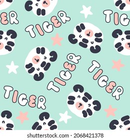 Seamless pattern with tiger faces, stars and text TIGER. Perfect for T-shirt, textile and print. Hand drawn vector illustration for decor and design.

