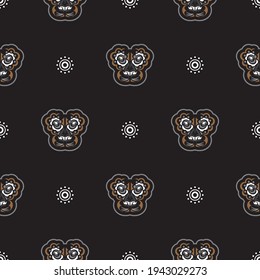 Seamless pattern with tiger head in simple boho style. Good for clothing, textiles and prints. Vector illustration.