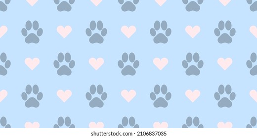 Seamless pattern with tiger paw footprints and pink hearts on pastel blue background.