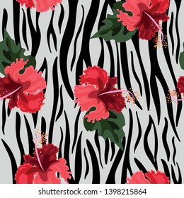 Seamless pattern with tiger skin and hibiscus flowers. Vector image.
