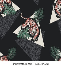 Seamless pattern of a tiger and tropical leaves background vector elements.