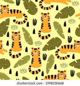 Seamless pattern with tigers, plants, decor elements. colorful vector for kids. hand drawing, flat style. baby design for fabric, print, textile, wrapper