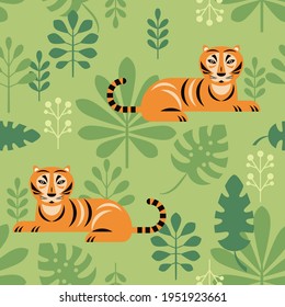 Seamless pattern with tigers and tropical leaves, green background