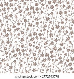 Seamless pattern of tiny field flowers.