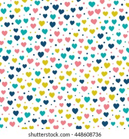 Seamless pattern with tiny hearts and dots of fresh colors on a white background. Vector repeating texture.