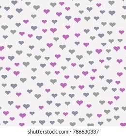 Seamless pattern of the tiny hearts. Light background