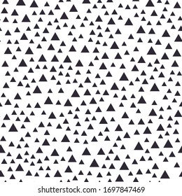 Seamless pattern of tiny random geometric elements. Monochrome. Black-white background. Abstract texture for printing fabrics, textiles, wallpaper. Vector.