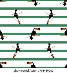 A seamless pattern with toucan birbs and green stripes on the background.