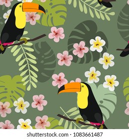 Seamless pattern with toucan. Tropical flowers and leaves. Monstera, palm, passion fruit.