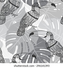 Seamless pattern with toucans and  palm leaves. Monochrome tropical background.
