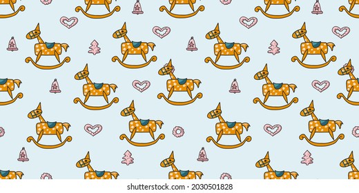 Seamless pattern with toy wooden rocking horse and sweet gingerbread.Hand drawn cute print for posters, cards, t-shirts.