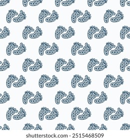 Seamless pattern with traces of children's feet on a white background
