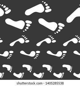  Seamless pattern with traces of different sizes. Traces of the family - men, women, children. Abstract hand painted repeat texture on white background.