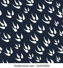 Seamless pattern with traces of dinosaur.