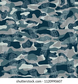 Seamless pattern with traces of military boots on camouflage background. Can be used for graphic design, textile design or web design.