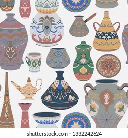 Seamless pattern with traditional Arabic utensils collection. Oriental dishes, pots, lantern, bowl, plates, pottery, ceramic with national floral ornament. Vector illustration	