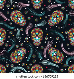 Seamless pattern, traditional elements. Colorful skulls with flowers and feathers