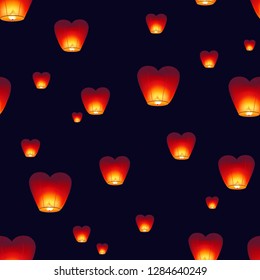 Seamless pattern with traditional Kongming lanterns flying in dark night sky. Backdrop with Chinese decorations for mid autumn festival celebration. Colored vector illustration for textile print.