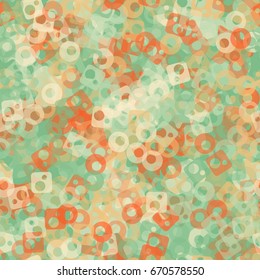 Seamless pattern. Translucent colored shapeless spots, circles and rounded squares with holes arranged at random. Fashion camo for men's, women's and children's clothing. Green, beige, orange tones.