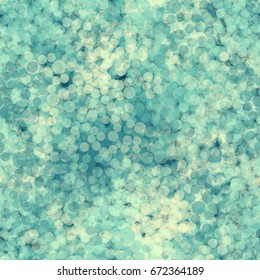 Seamless pattern. Translucent small circles arranged in a random order. The Boke. Blue, yellow.