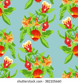 Seamless pattern tree branch with blossoming pomegranate fruits on blue background