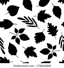 Seamless pattern tree leaves black silhouettes. Vector decorative background template. Autumn fall season design element.