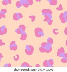 seamless pattern trend. pale peach background. lilac-pink leopard spots. vector texture. bright print for textiles and wallpaper.