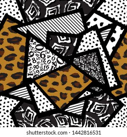 Seamless pattern of triangles animal print with different textures drawn by hands-vector illustration.