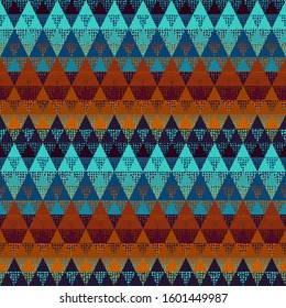 Seamless pattern of a triangles.. Aztec ornament. Vector image.