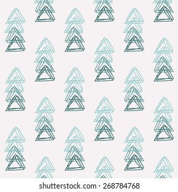 Seamless pattern with triangles drawn by hand. Sketch, Doodle. Vector.