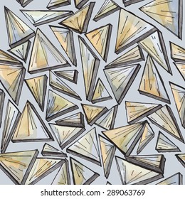Seamless pattern from the triangular pieces of a stone drawn with a water color.Background in vector.