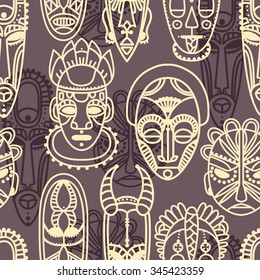 seamless pattern with tribal african masks, vector illustration